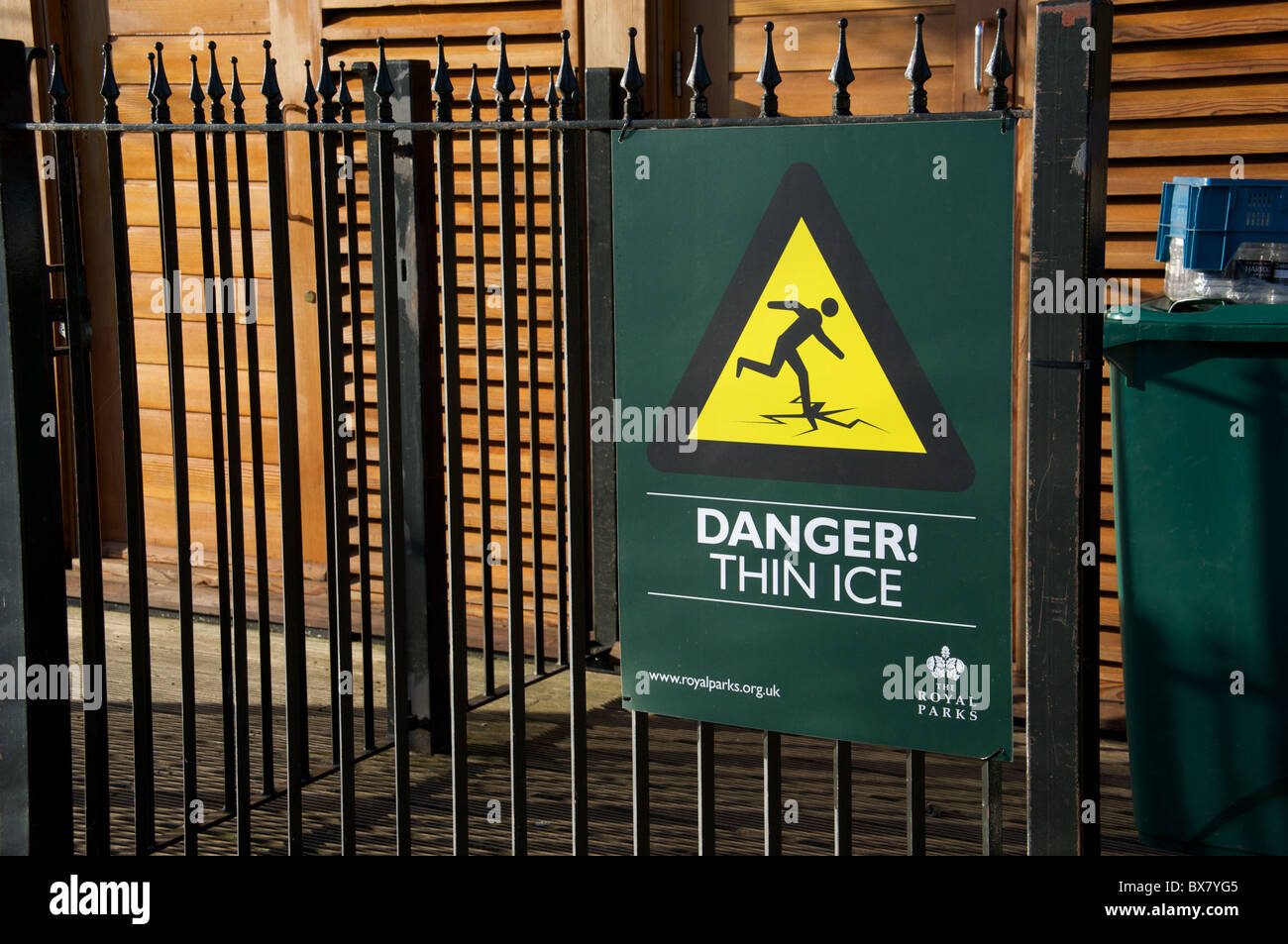 Warning sign 'Danger, Thin Ice' in Hyde Park, London, UK, winter Stock Photo