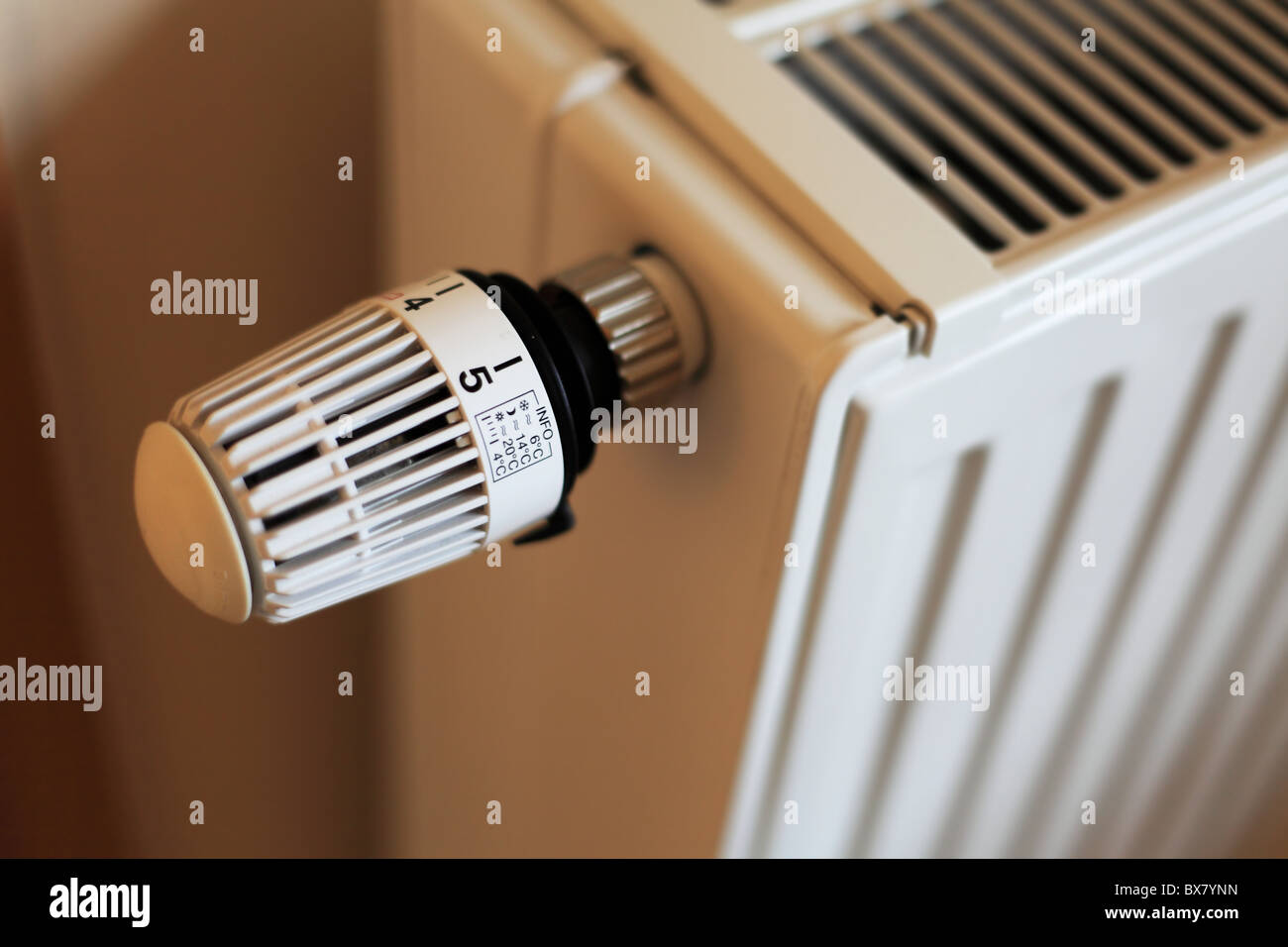 Control knob of a standard radiator is set to highest level. Stock Photo