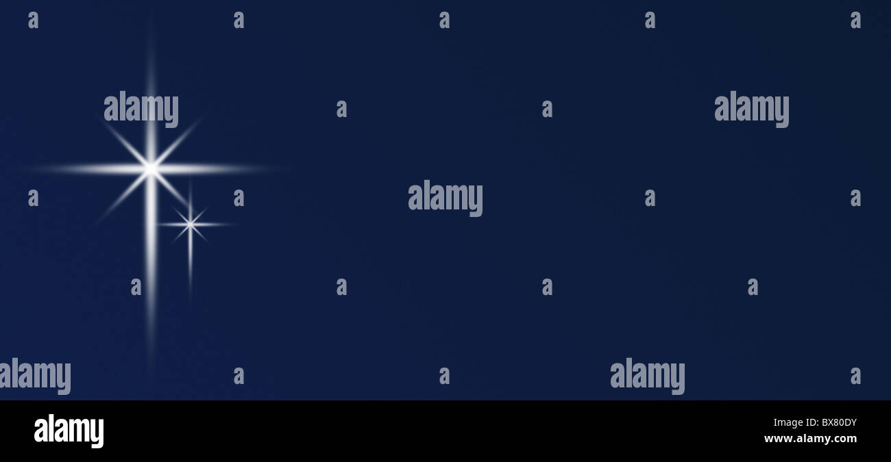 Bright stars in a blue christmas sky Stock Photo - Alamy