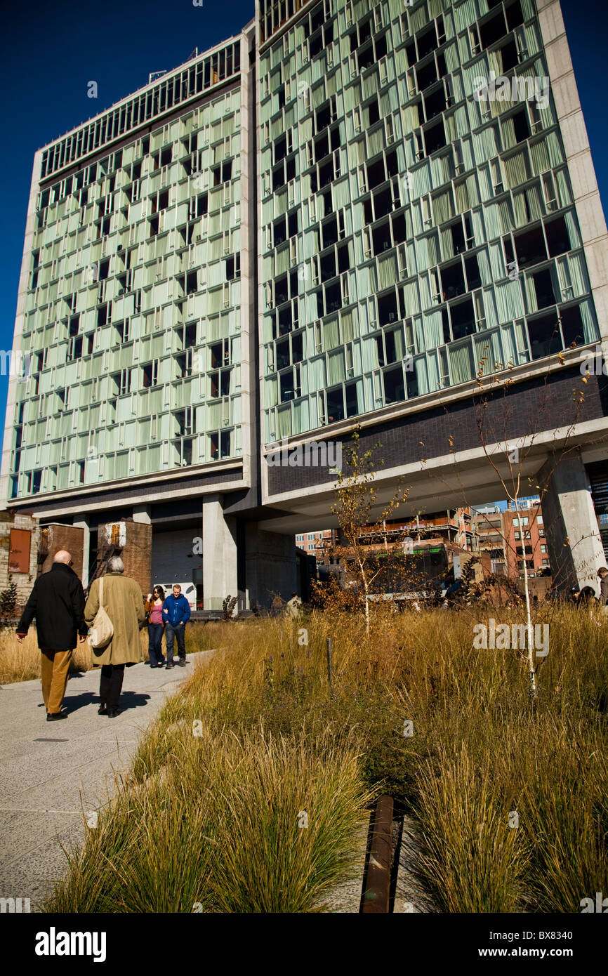 The elevated park known as the High Line which runs under the Standard Hotel in Meatpacking District of New York City. Stock Photo