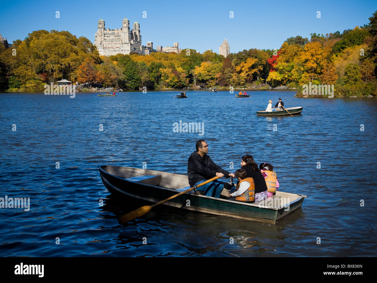 Boating on the rowboat lake in Central Park in autumn in New York City. Stock Photo