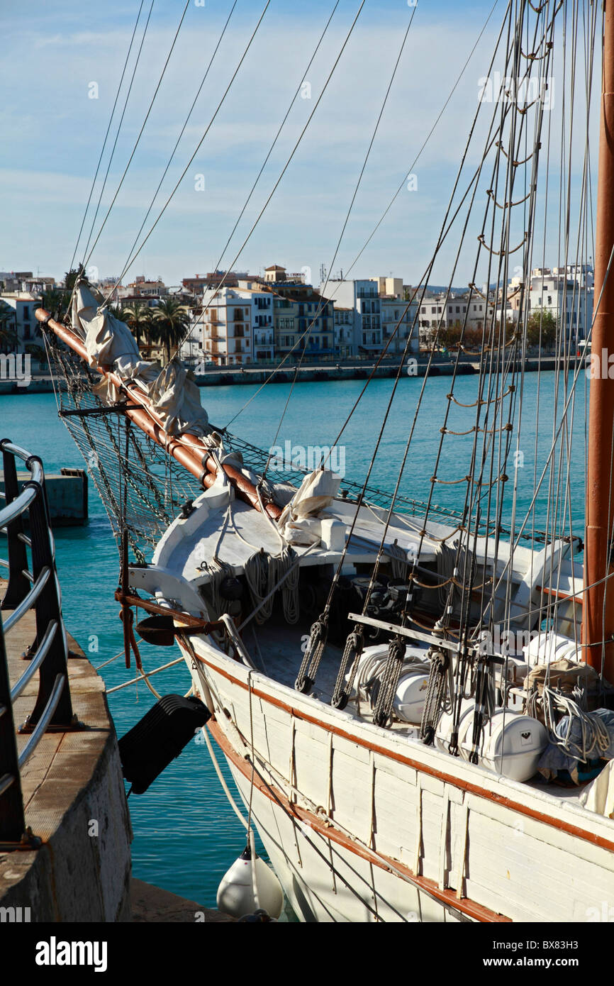 Partial view of a schooner moored at the harbor of Ibiza, Spain Stock Photo