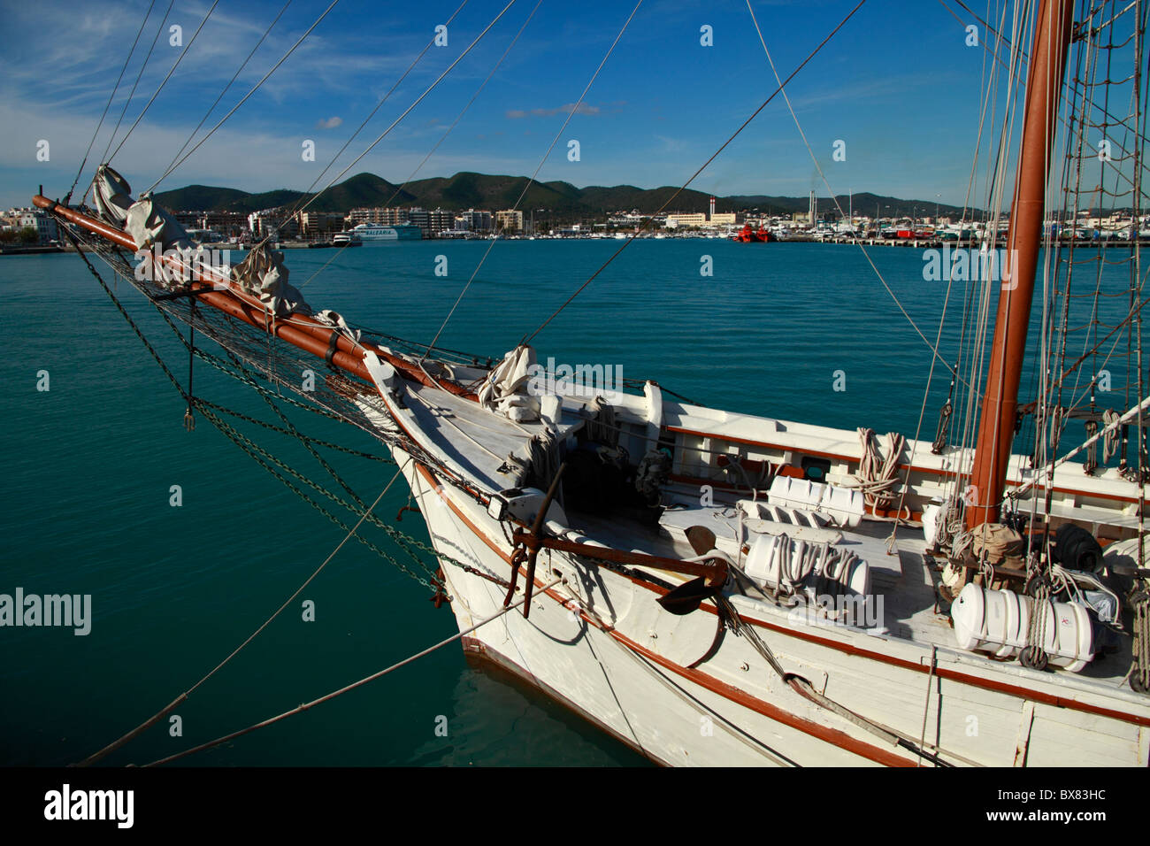 Partial view of a shooner moored at the harbor of Ibiza, Spain Stock Photo