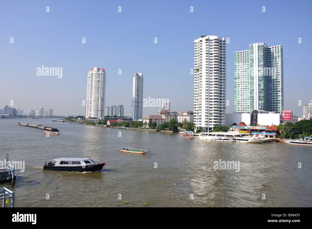 River boats on Chao Phraya River from Bang Rak District, Bangkok, Thailand Stock Photo