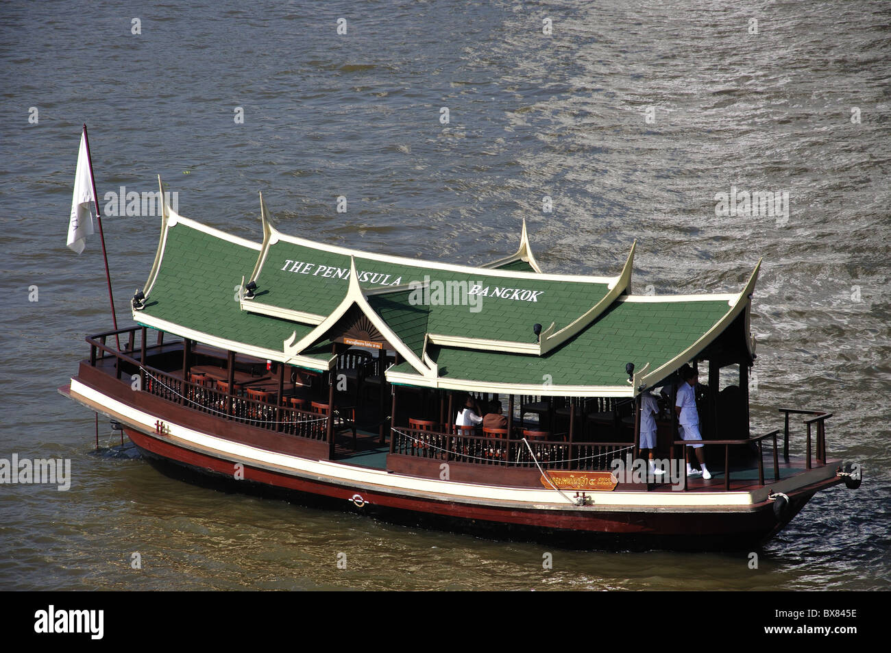 River boat on Chao Phraya River, Bang Rak District, Bangkok, Thailand Stock Photo