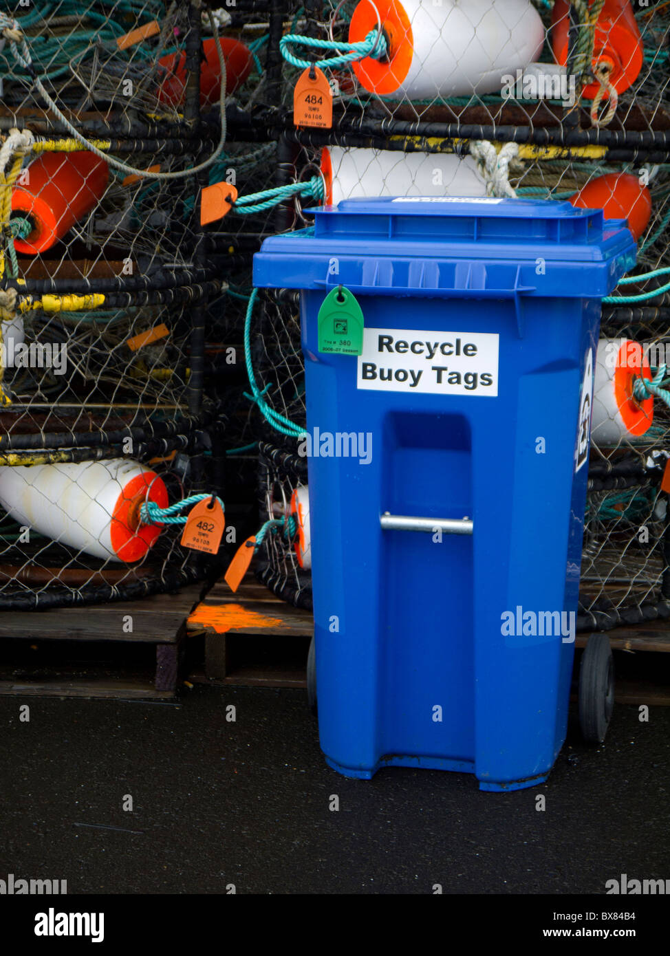 Plastic buoy tags need to be recycled each year at crabbing season. Stock Photo