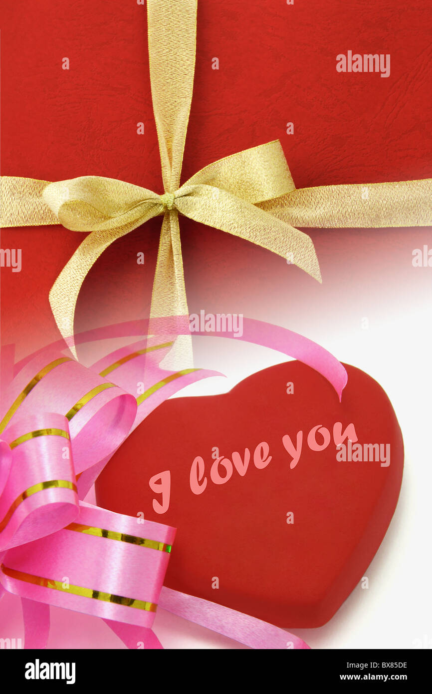 Composite image of decorative ribbons and heart shape symbol with 'I love you' for Valentine day Stock Photo
