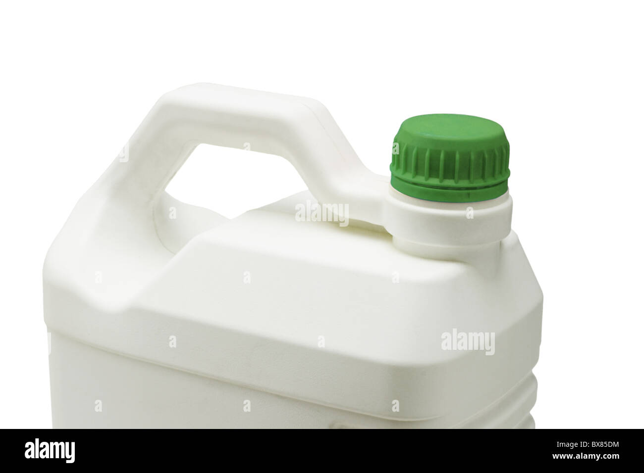 Close up of plastic storage container with green cap on white background Stock Photo