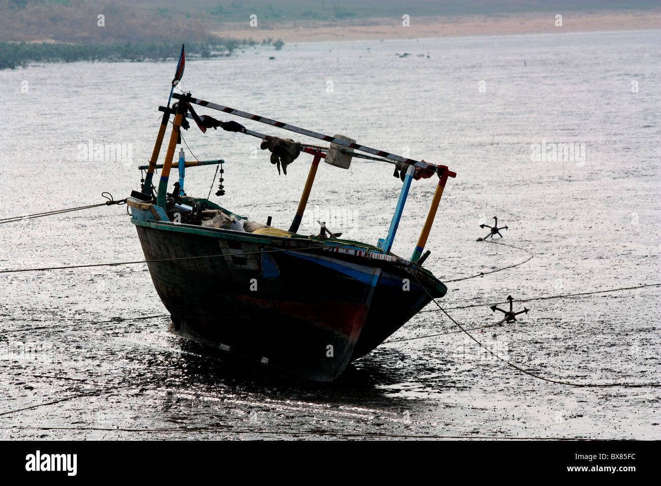 A broken boat on the shore of Kutch, Gujarat Stock Photo