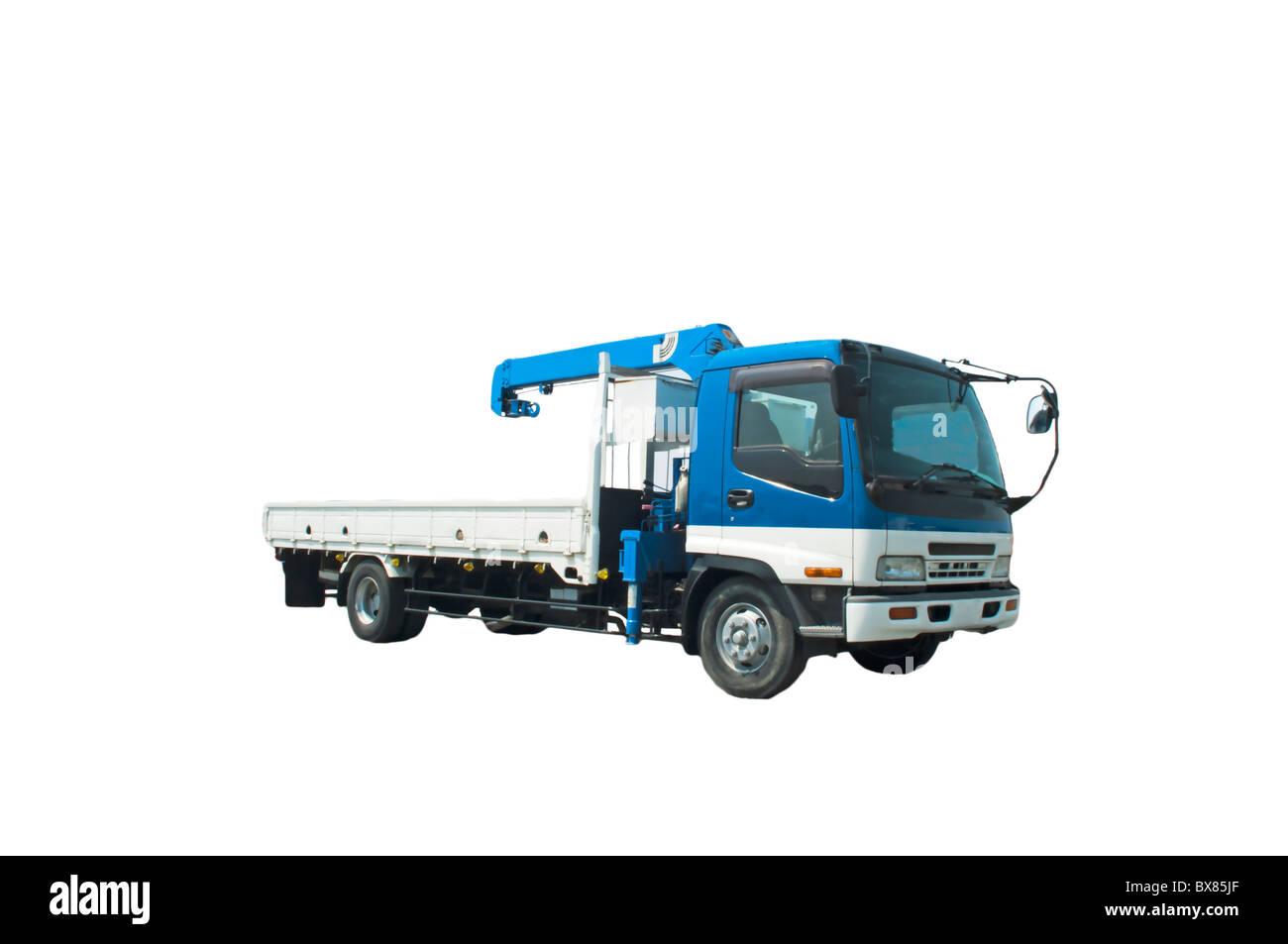 The average truck with the crane - a beam for a raising of weights Stock Photo