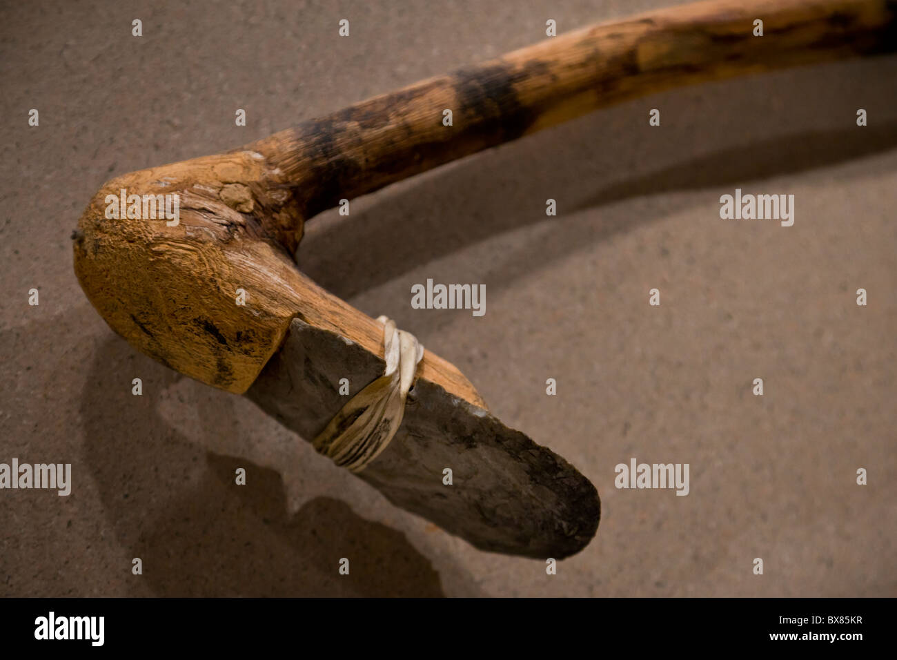 Mississippian period stone hoe formed from a chert blade strapped to a handle at Cahokia Mounds, Illinois, USA. Stock Photo