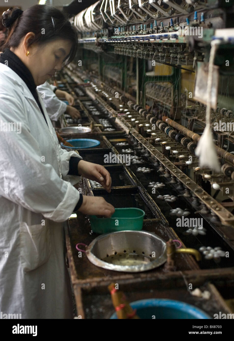 China Zhujiajiao Silk factory, finding the thread Stock Photo