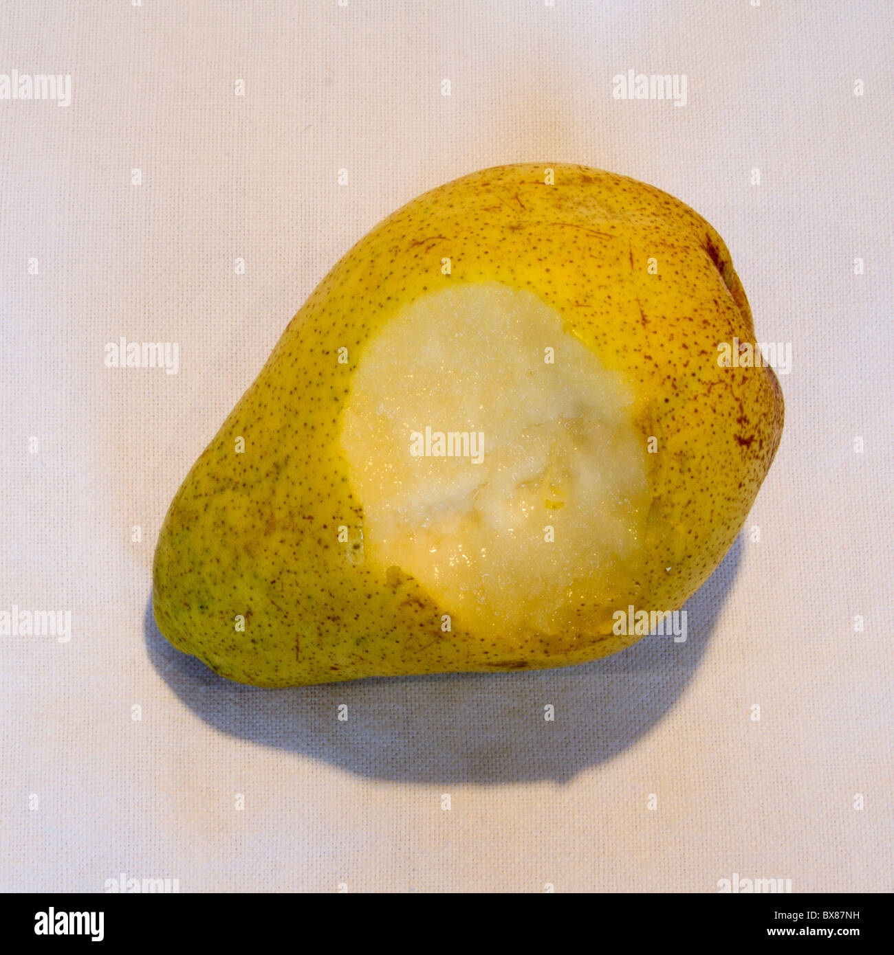 half-eaten pear food Stock Photo
