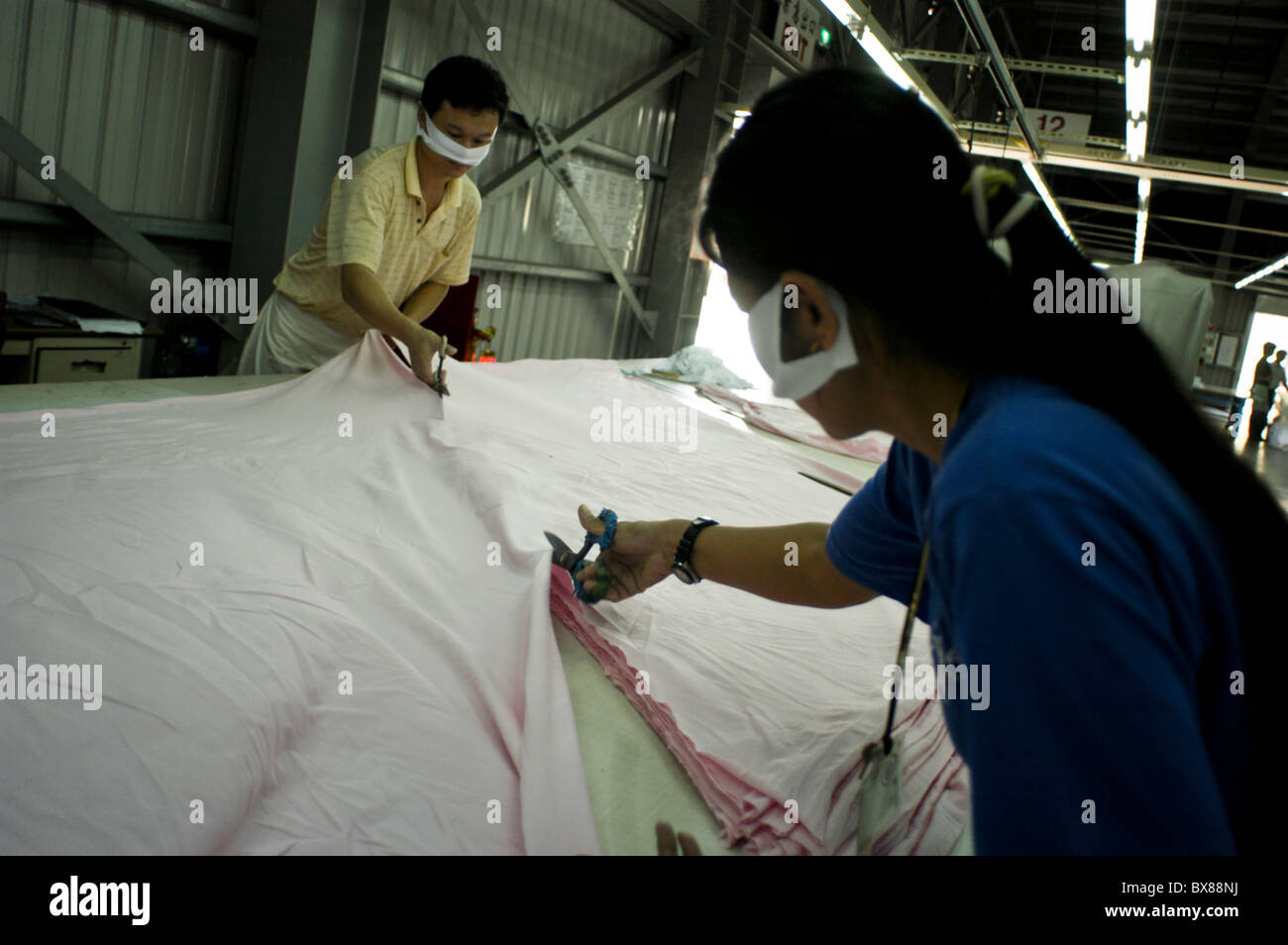 Garment workers at work in the United International Corp. garment