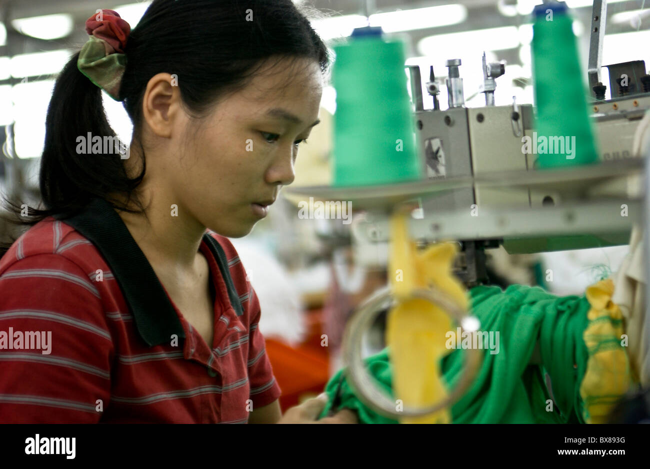 Sewers at work in the United International Corp. garment factory in San