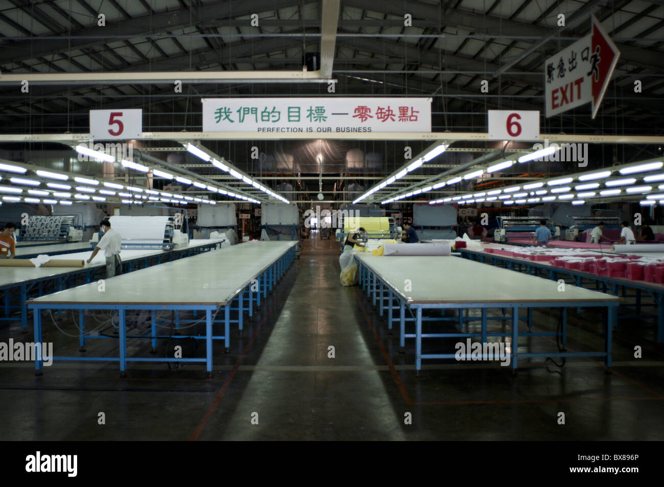 Packers at work in the United International Corp. garment factory in