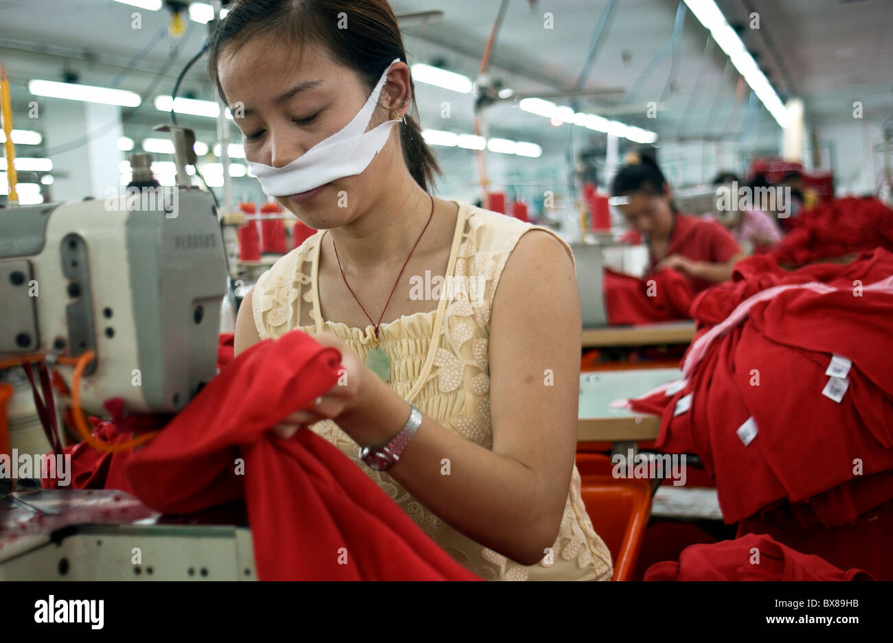 Garment workers at work in the United International Corp. garment