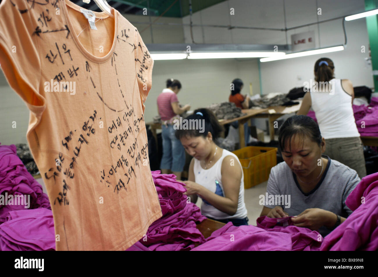 Garment workers at work in the Rifu Co. garment factory in San Antonio