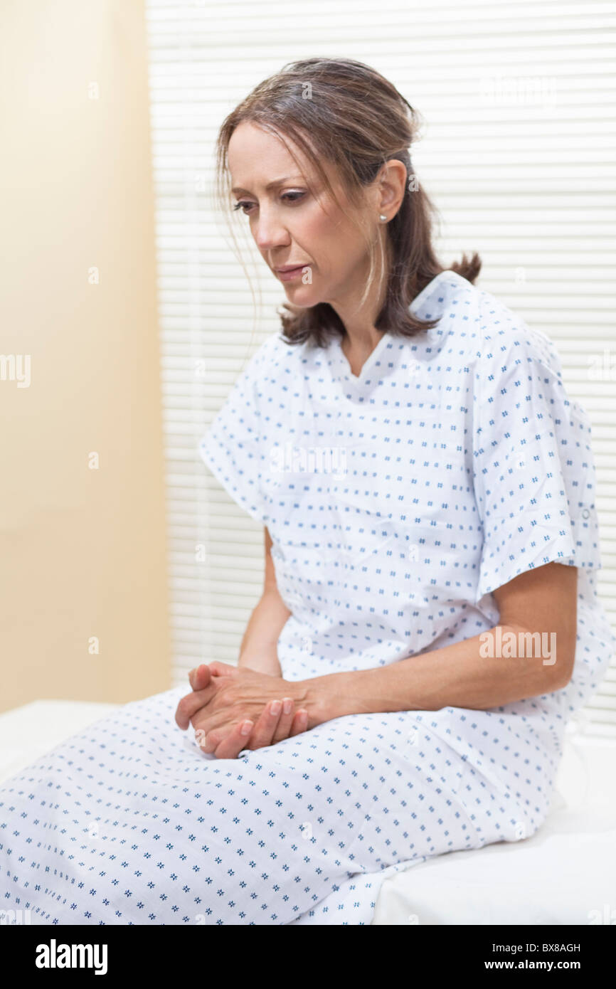 Patient on examination table Stock Photo - Alamy