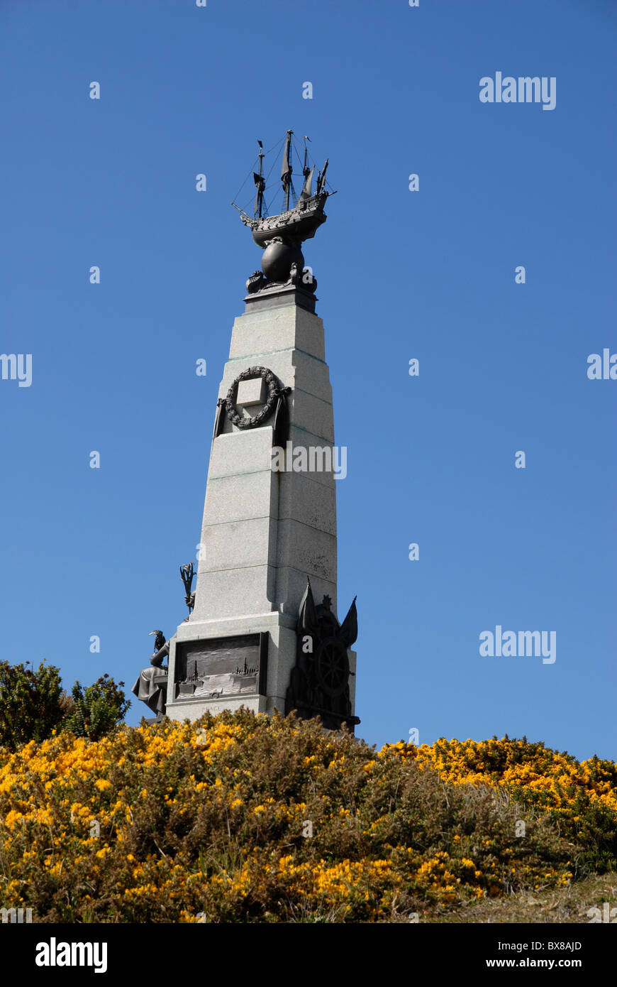 1914 Battle of the Falkland Islands Memorial with flowering gorse, Stanley, Falkland Islands Stock Photo