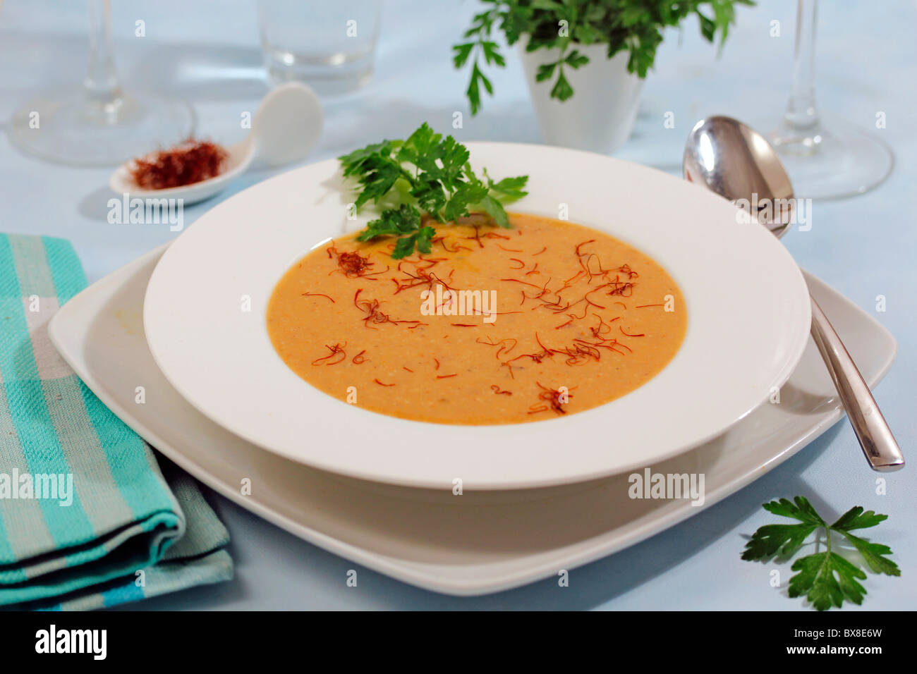 Monkfish soup with saffron. Recipe available. Stock Photo