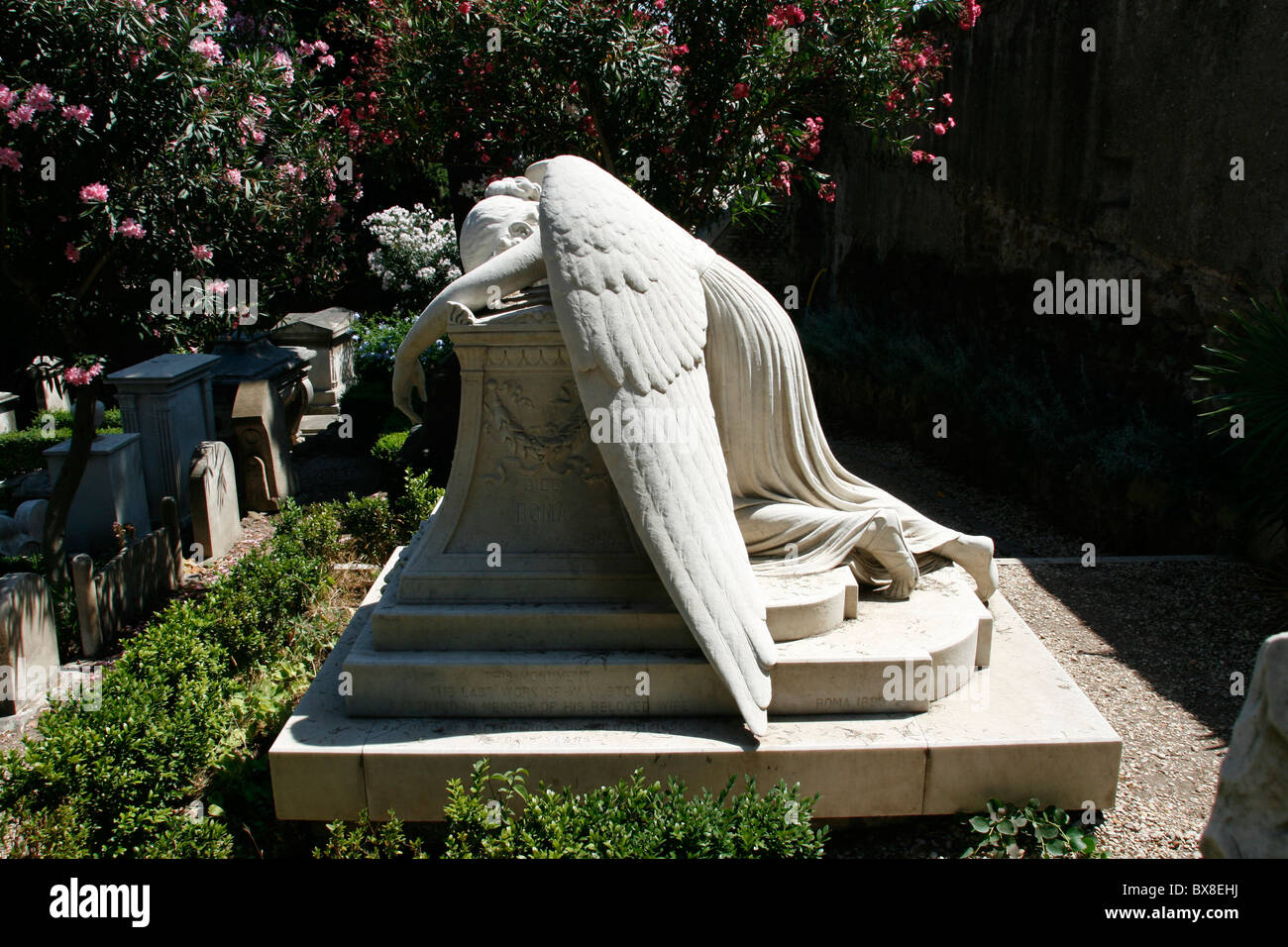gravestone statue in protestant cemetery near piramide, rome Stock