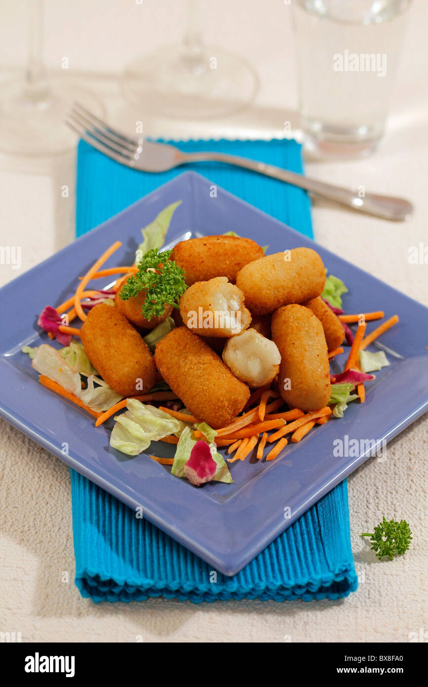 Potato and goat cheese croquettes. Recipe available Stock Photo Alamy