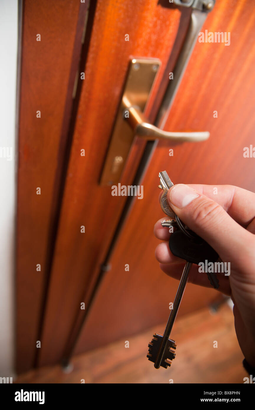 Breaking keys in the door lock Stock Photo