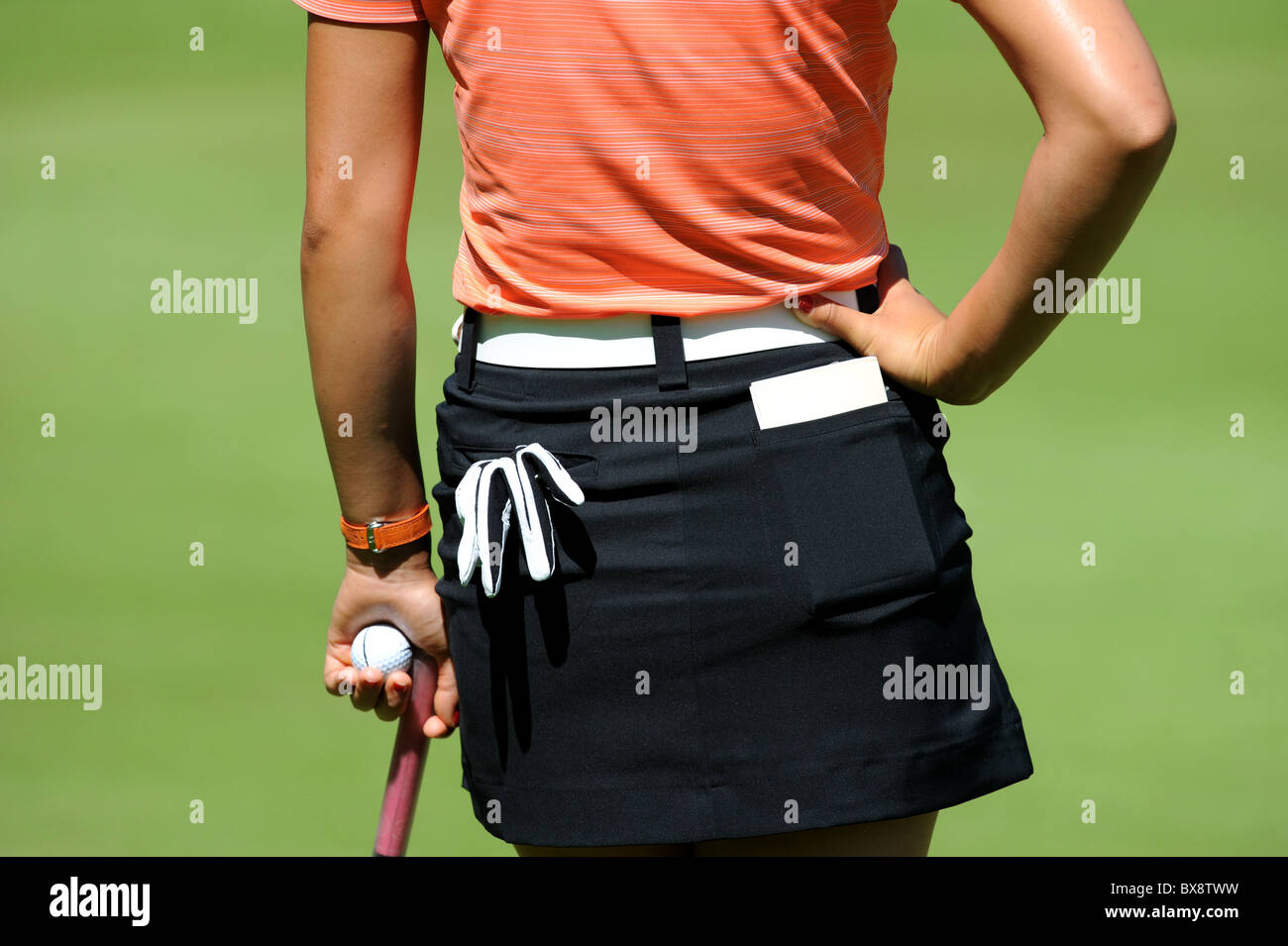 Close up of a woman playing golf Stock Photo