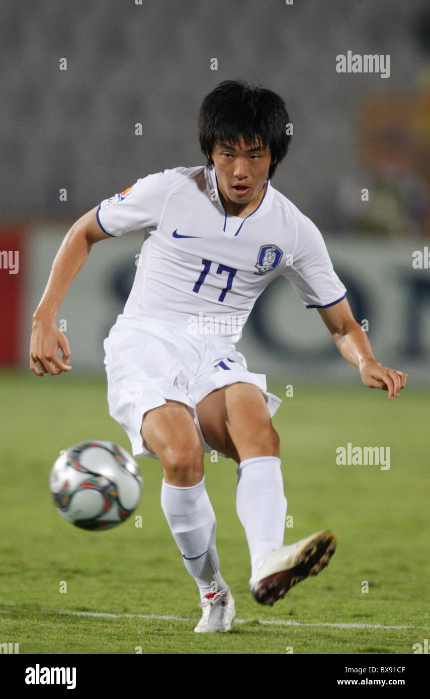 Suk Young Yun of South Korea passes the ball during a FIFA U-20 World Cup round of 16 match against Paraguay October 5, 2009. Stock Photo