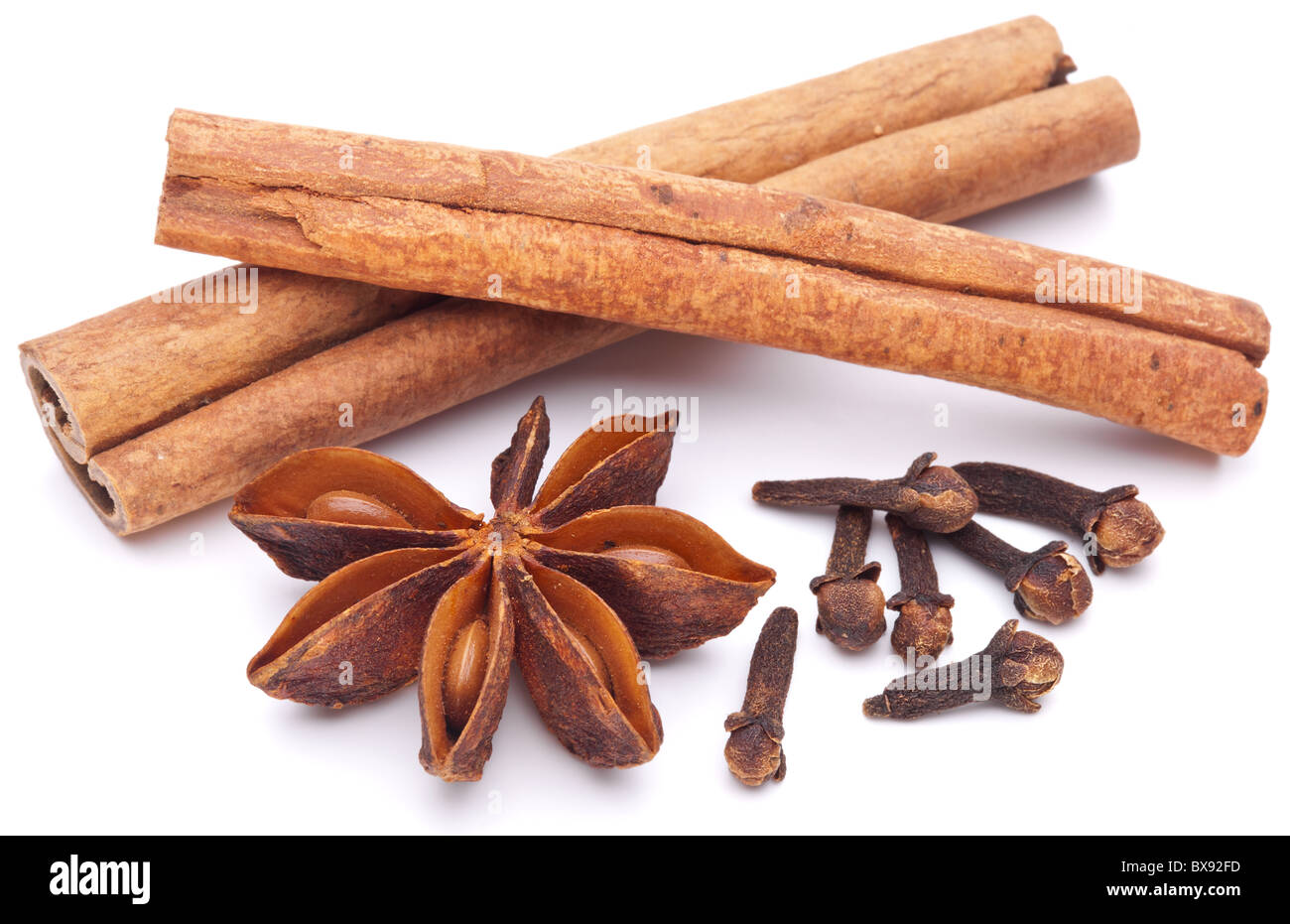 Cloves, anise and cinnamon isolated on white background. Stock Photo