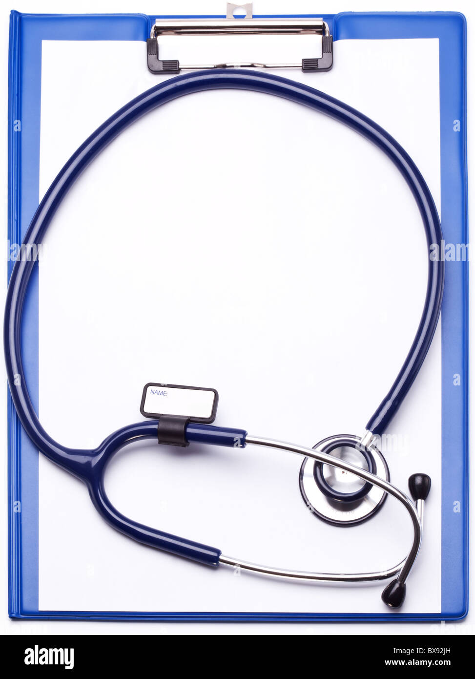 Medical stethoscope with a clipboard on a white background. Stock Photo