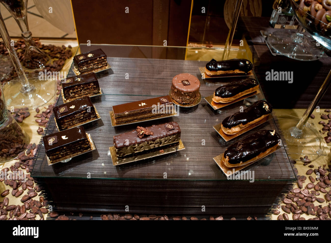 Paris, France, Clsoe up,  Luxury Shopping, 'Michel Cluizel', French Chocolate Shop Window, Eclairs, Cakes on Display, Chocolatier Pastries, sweet shop paris Stock Photo