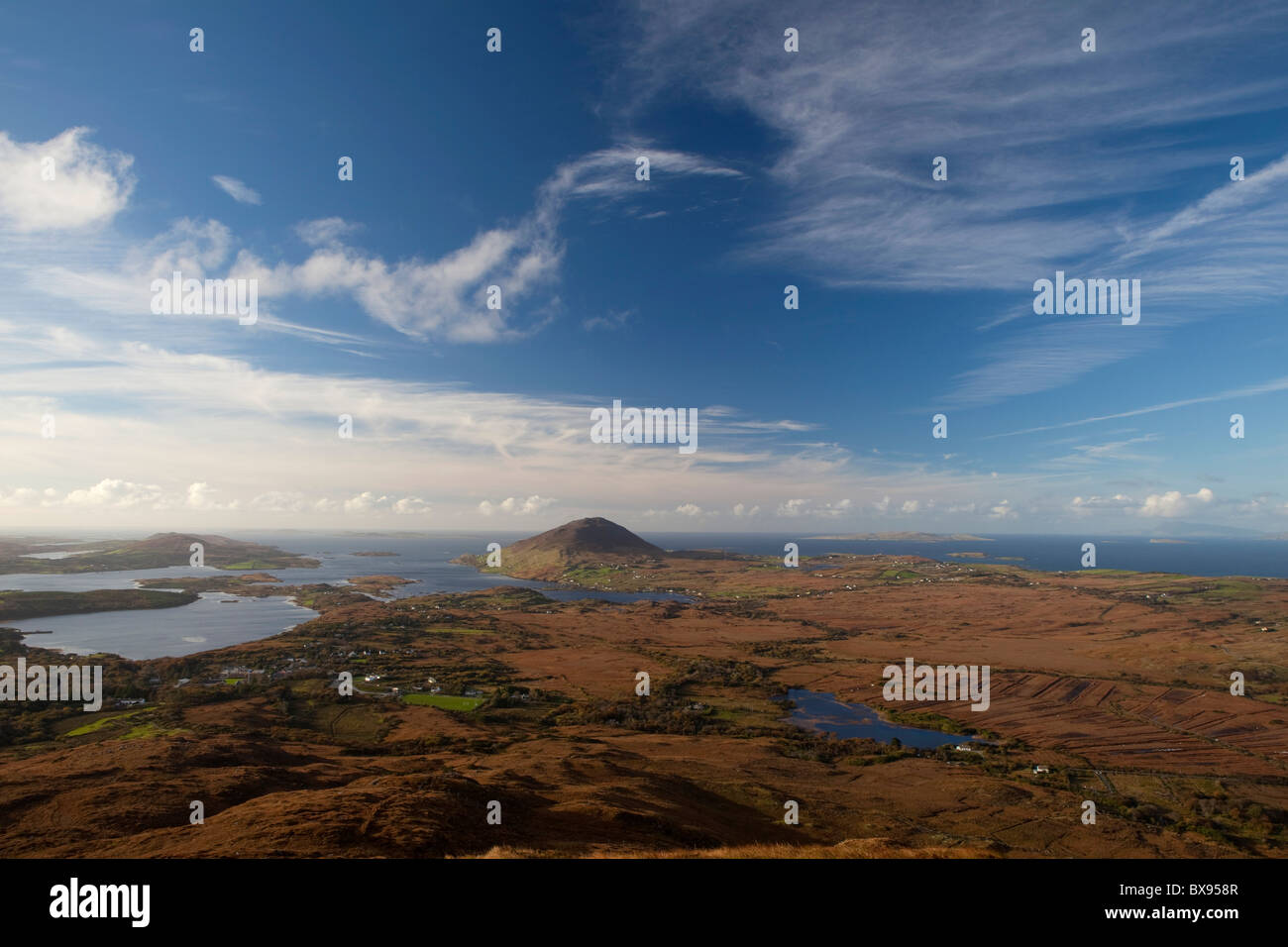 The view of Ballinakill Bay and the Connemara coast, including Tully Mountain, seen from Diamond Hill, Connemara Stock Photo