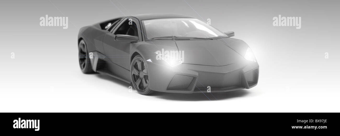 A model sports car isolated against a white background Stock Photo Alamy
