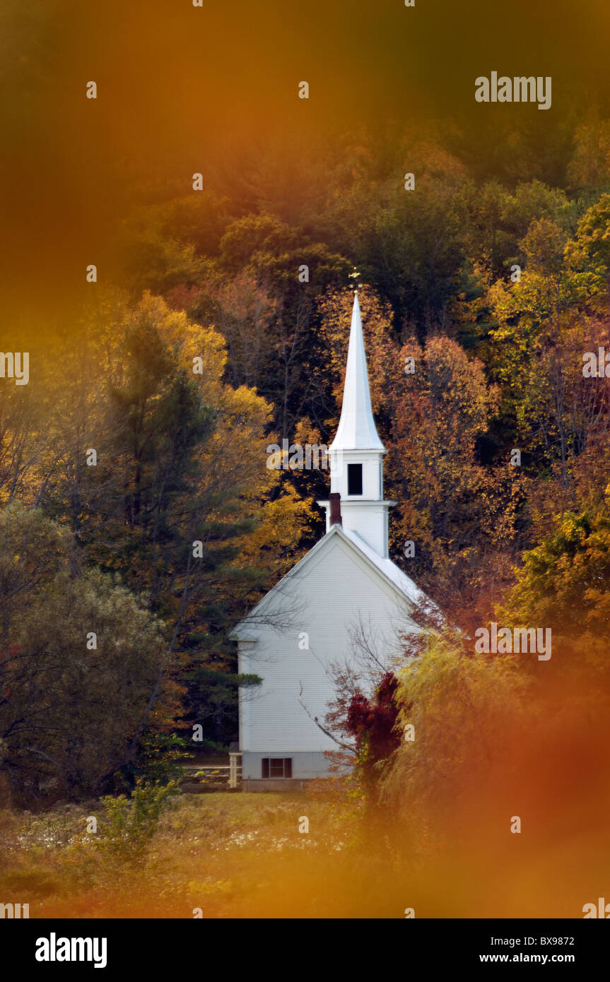 Little White Church Seen through Autumn Leaves in Eaton, New Hampshire Stock Photo