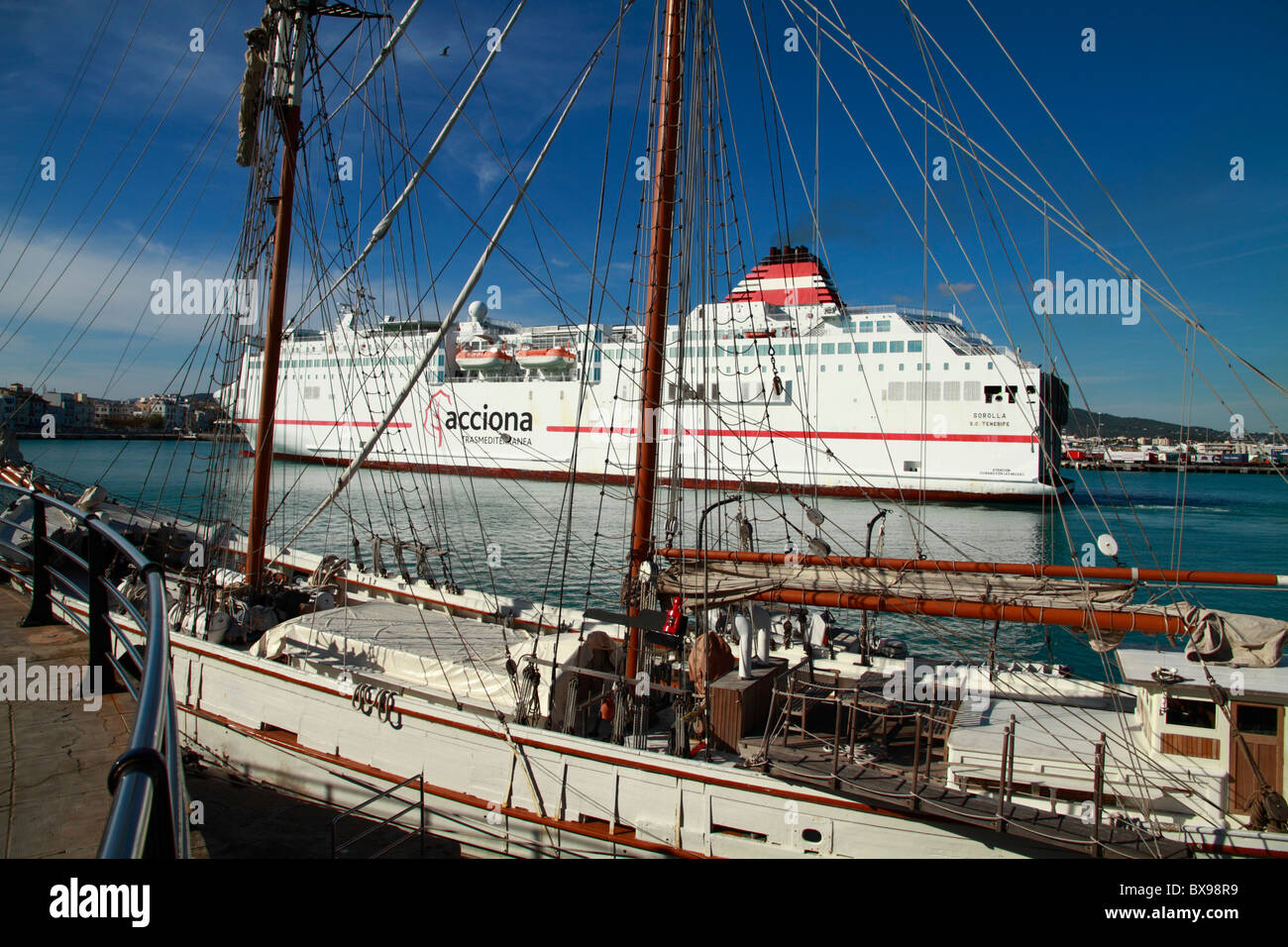 Moored schooner, liner in the background Stock Photo