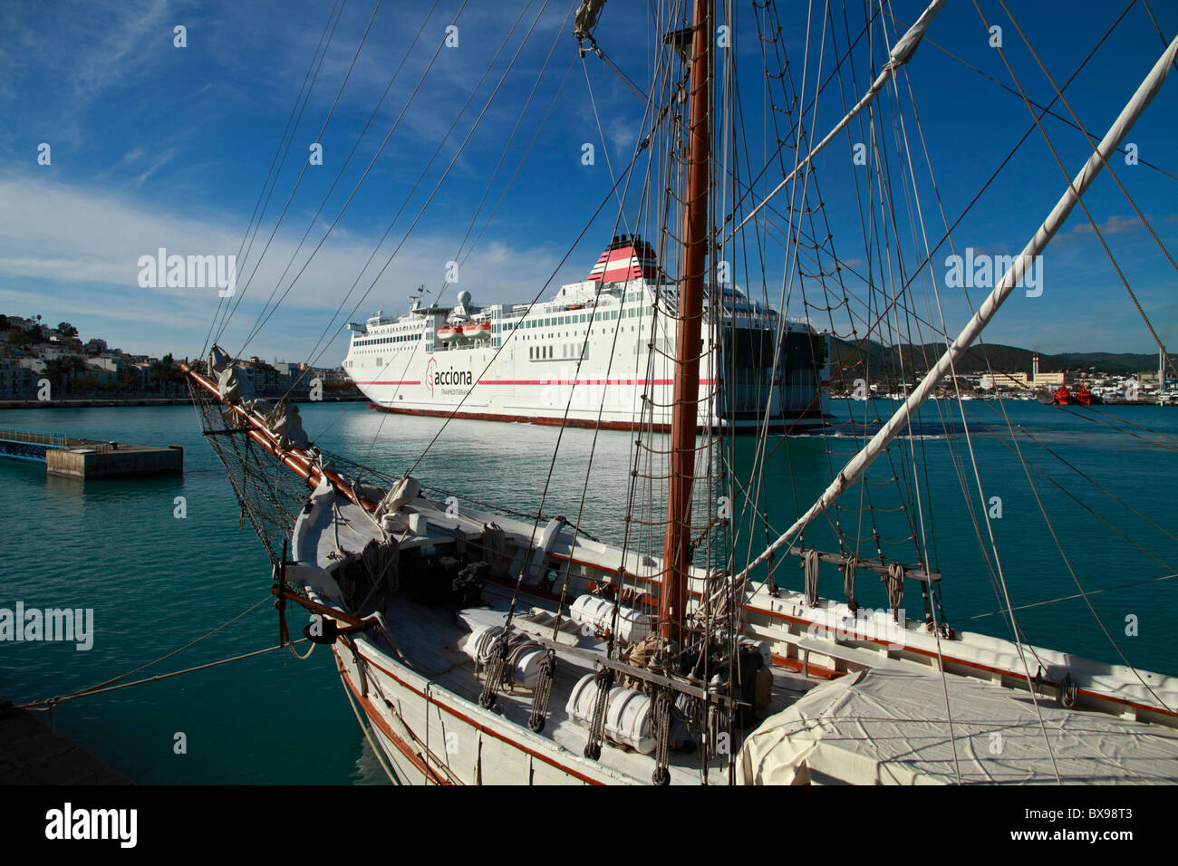 Moored schooner, liner in the background Stock Photo