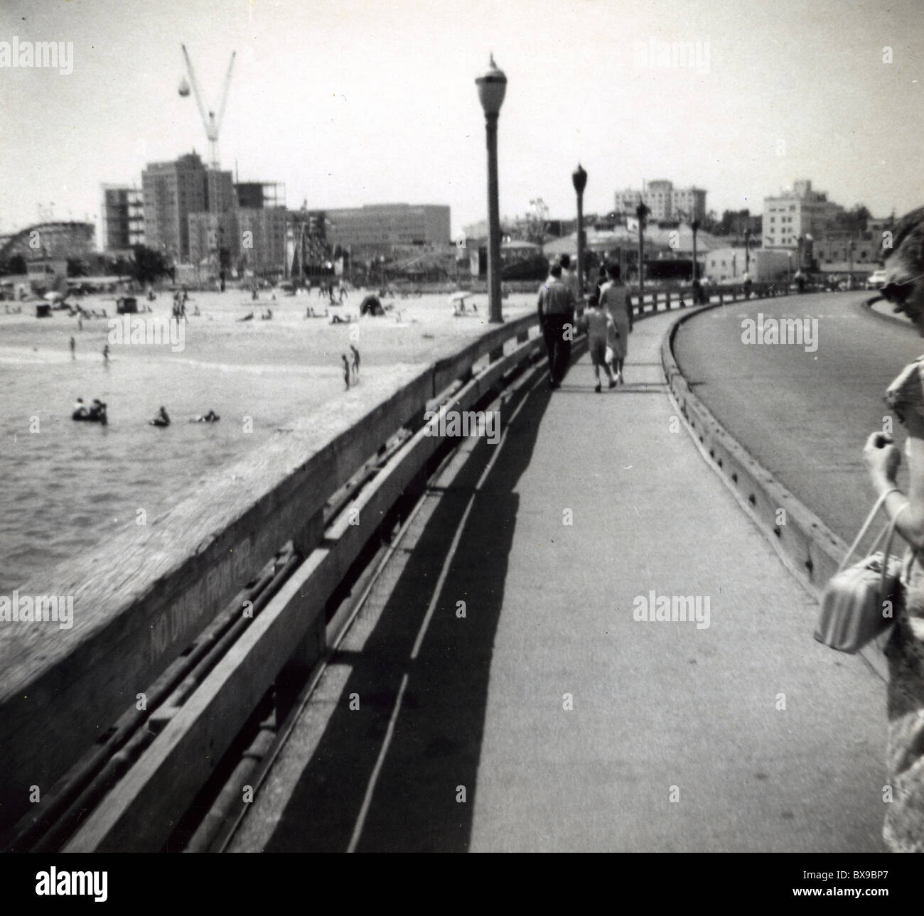 Pier and amusement park Long beach California 1950s Americana black and white beach southern sidewalk tourists Stock Photo