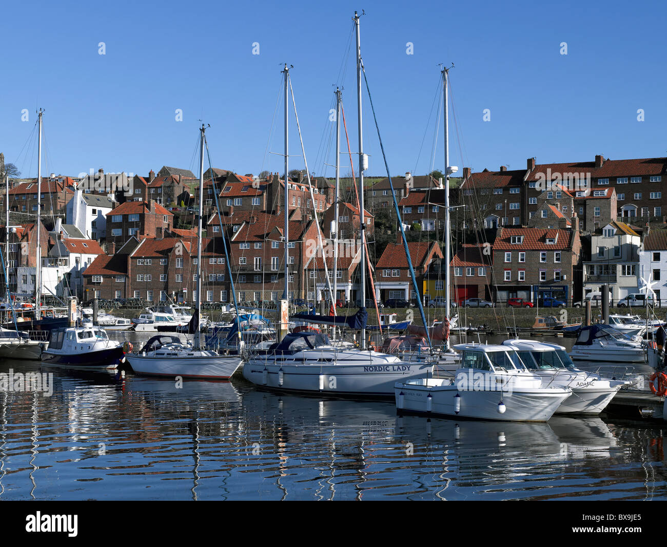 Yachts yacht boat boats moored on the River Esk in winter Whitby ...