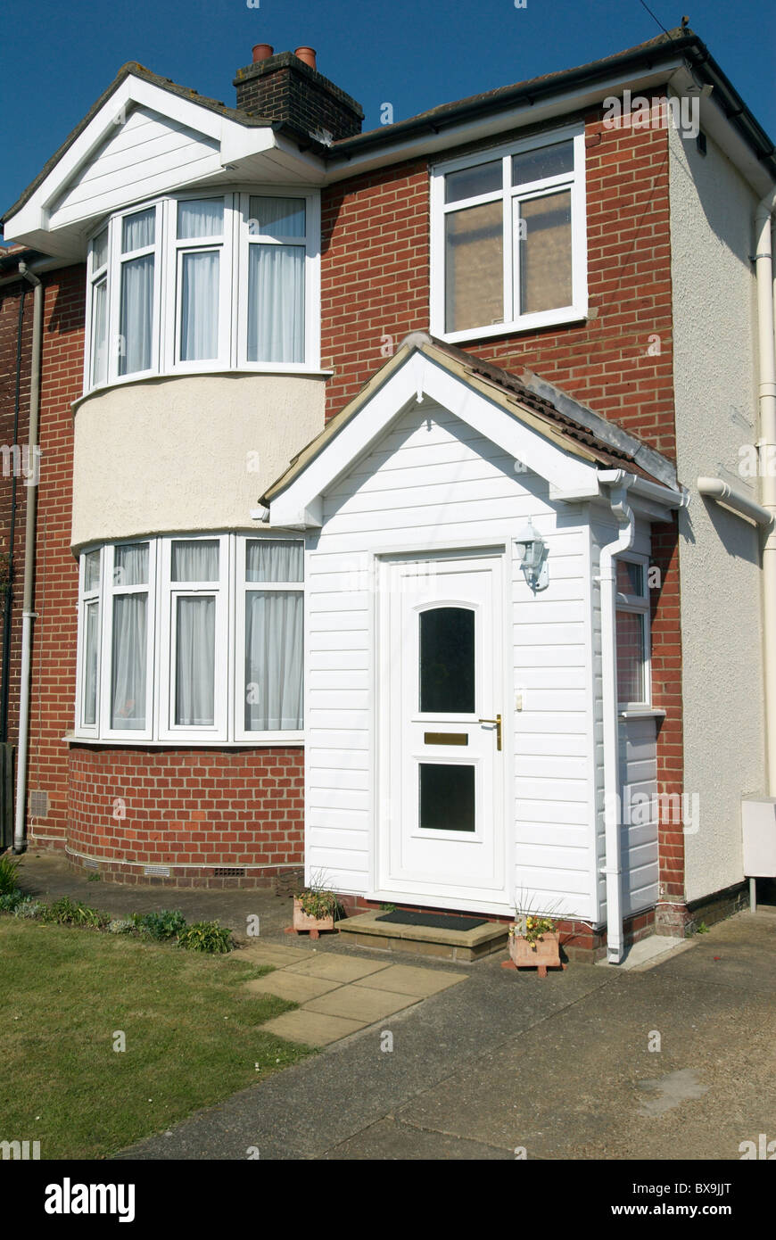 PVC porch on semi-detached house Ipswich Suffolk UK Stock Photo