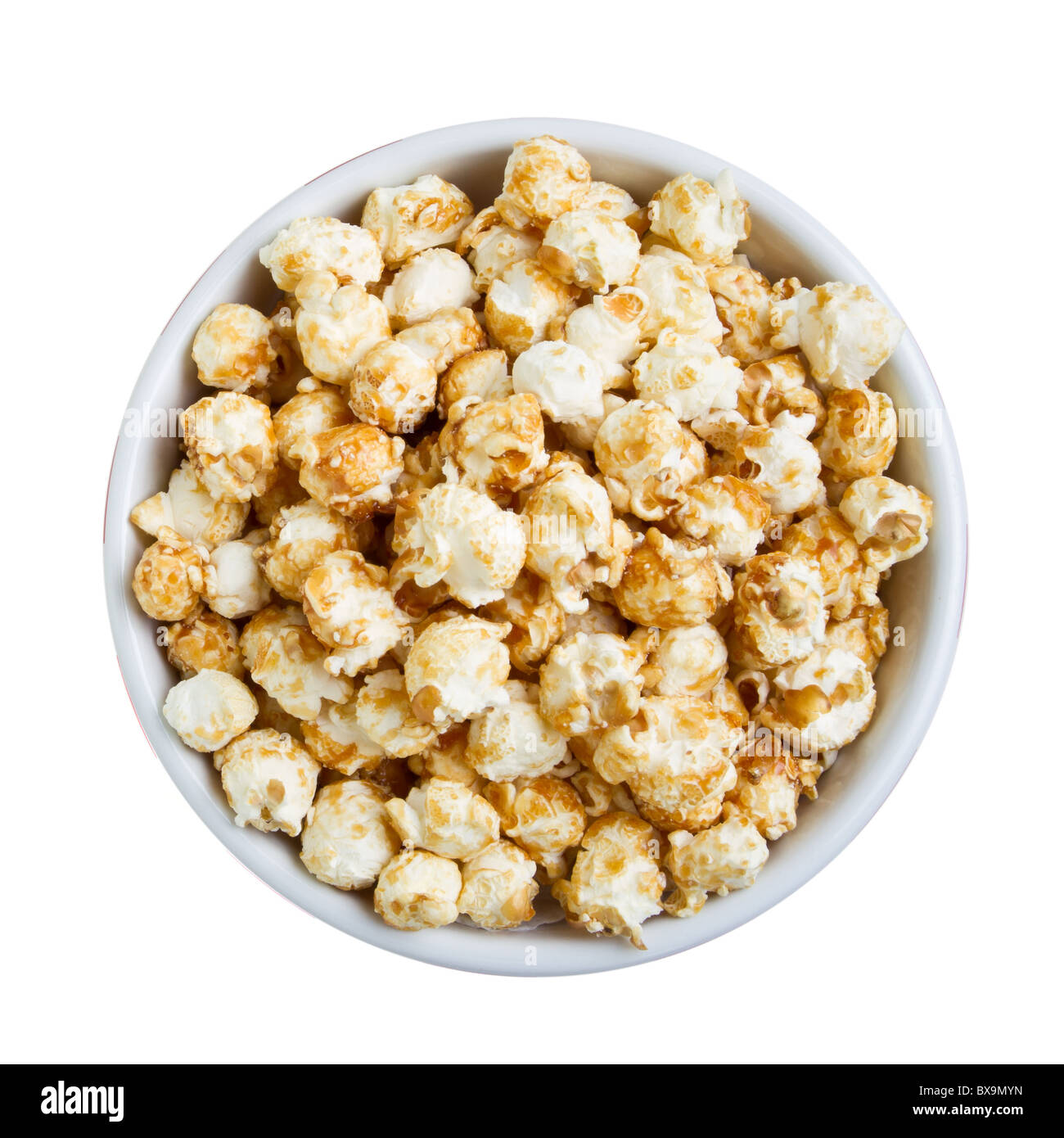 overhead view of bowl of popcorn isolated on white. Stock Photo