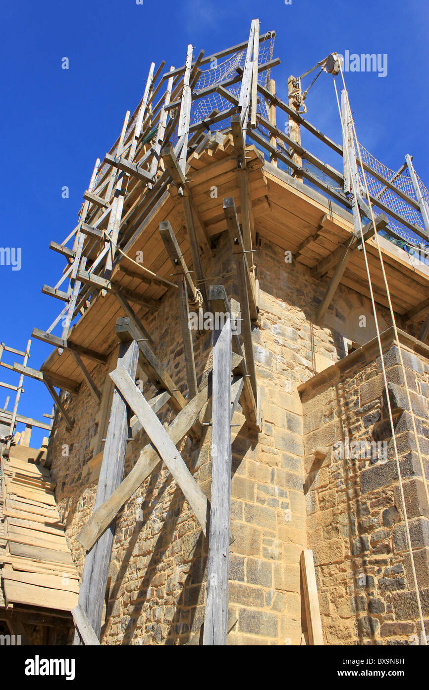 scaffolding for the construction and renovation of a medieval castle Stock Photo