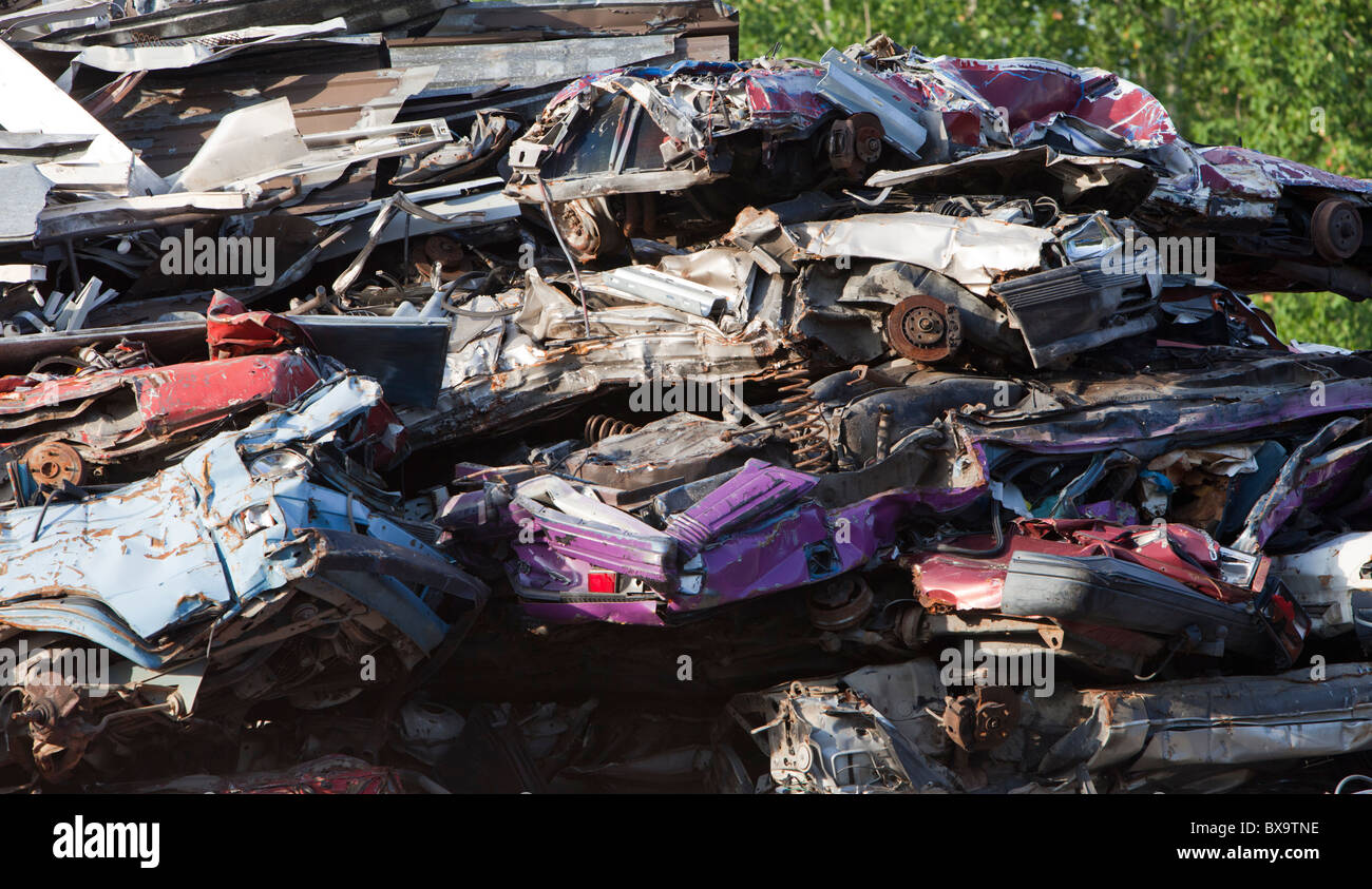 Inventory pile of baled cars on scrapyard waiting for recycling , Finland Stock Photo