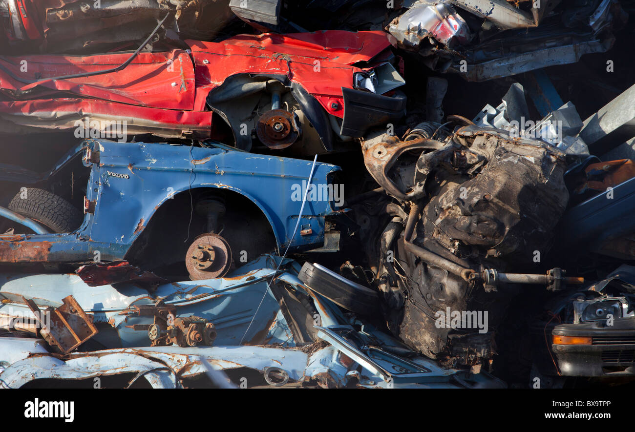 Close-up of pile of cars on scrapyard waiting for recycling , Finland Stock Photo