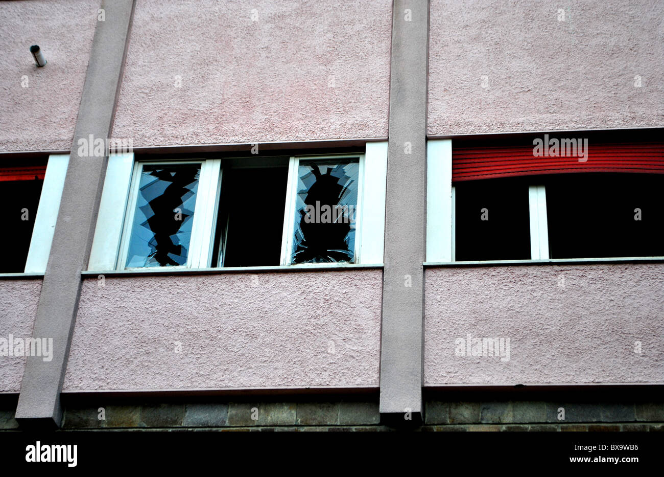 abandoned building with windows and broken glass Stock Photo - Alamy