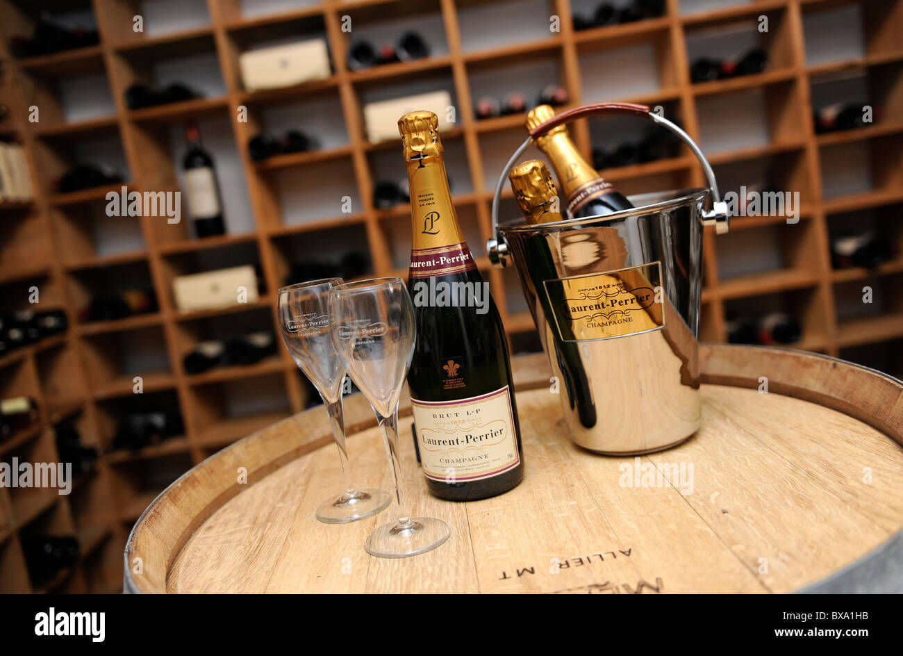 Bottles of Champagne with glasses and ice bucket ready for a taste. Stock Photo