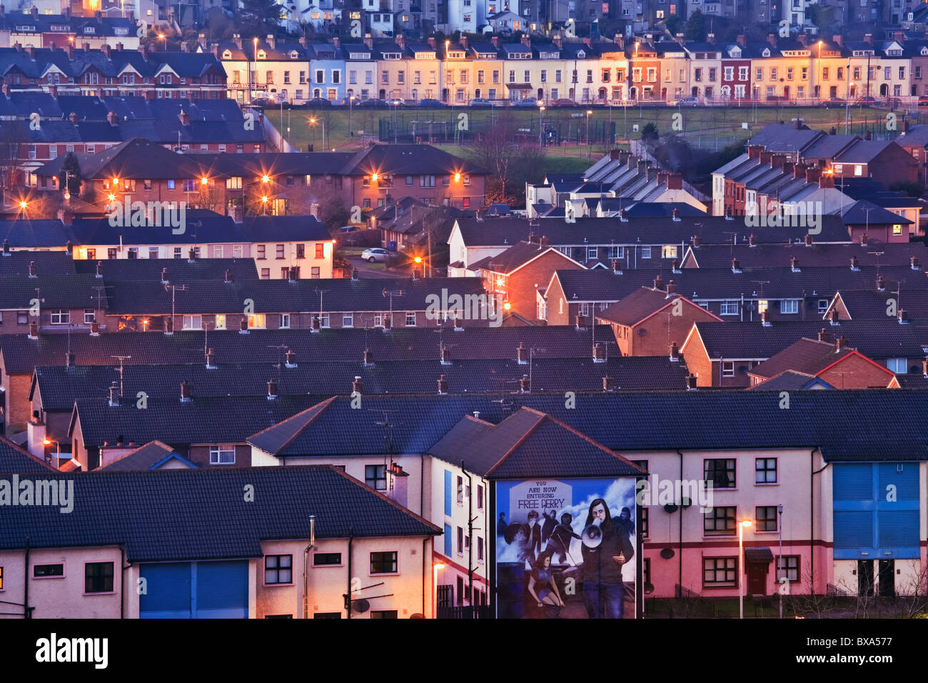 The Bogside district of the city of Derry at dusk, County Derry, Northern Ireland Stock Photo