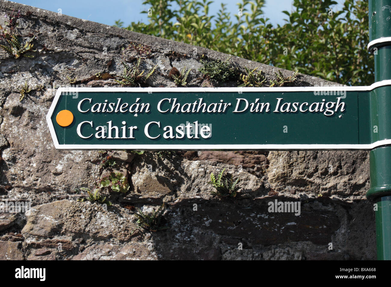 Sign pointing to the famous Cahir Castle, Co Tipperary, Ireland (Eire). Stock Photo