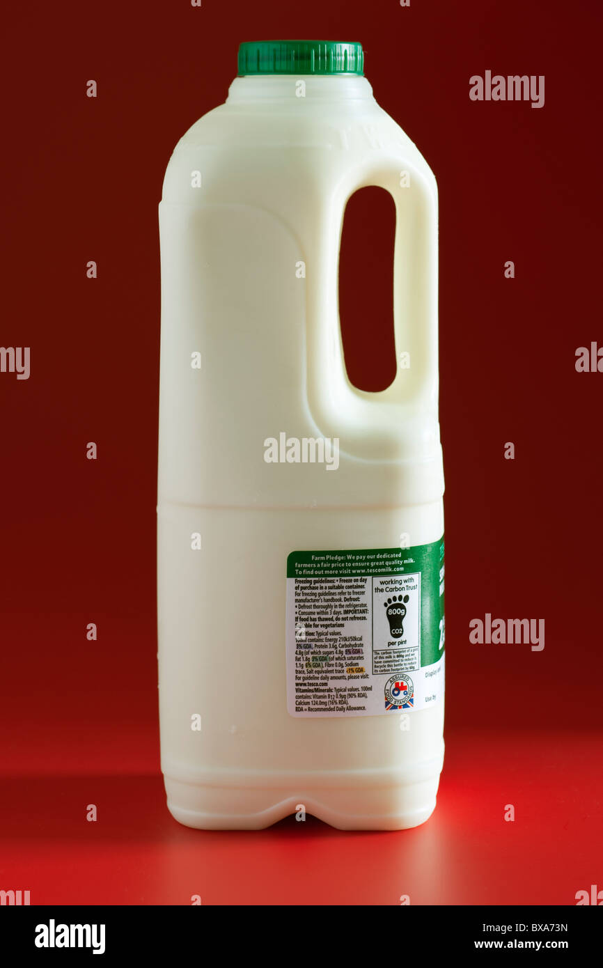 Two pint plastic container of Green top semi skilled milk Stock Alamy